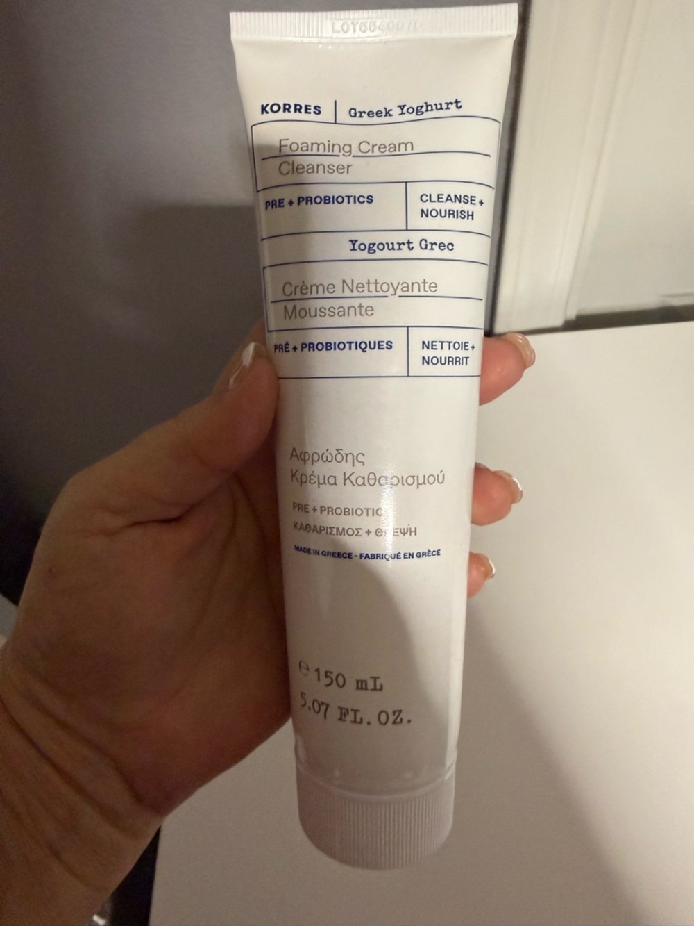 Korres Foaming Cream Cleanser White with Blue Text